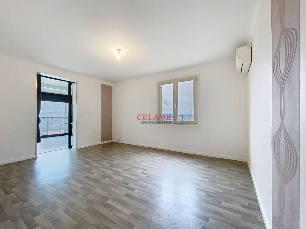 BEL APPARTEMENT AVEC VERANDA SUR LES HAUTEURS DE TULLE