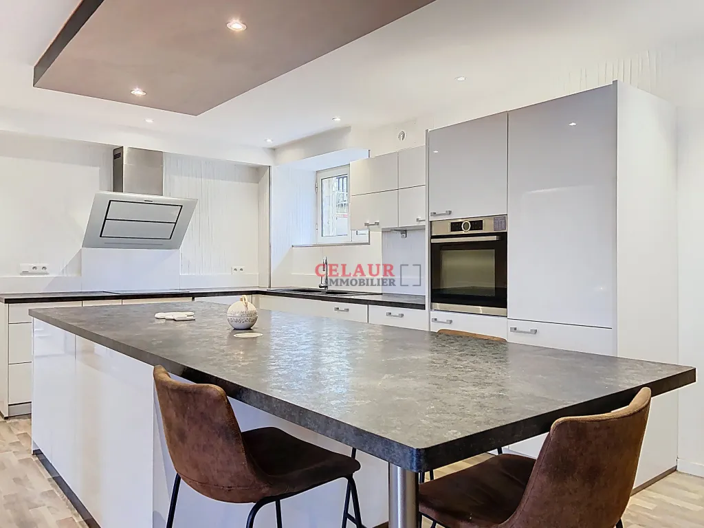 BEL APPARTEMENT AVEC VERANDA SUR LES HAUTEURS DE TULLE