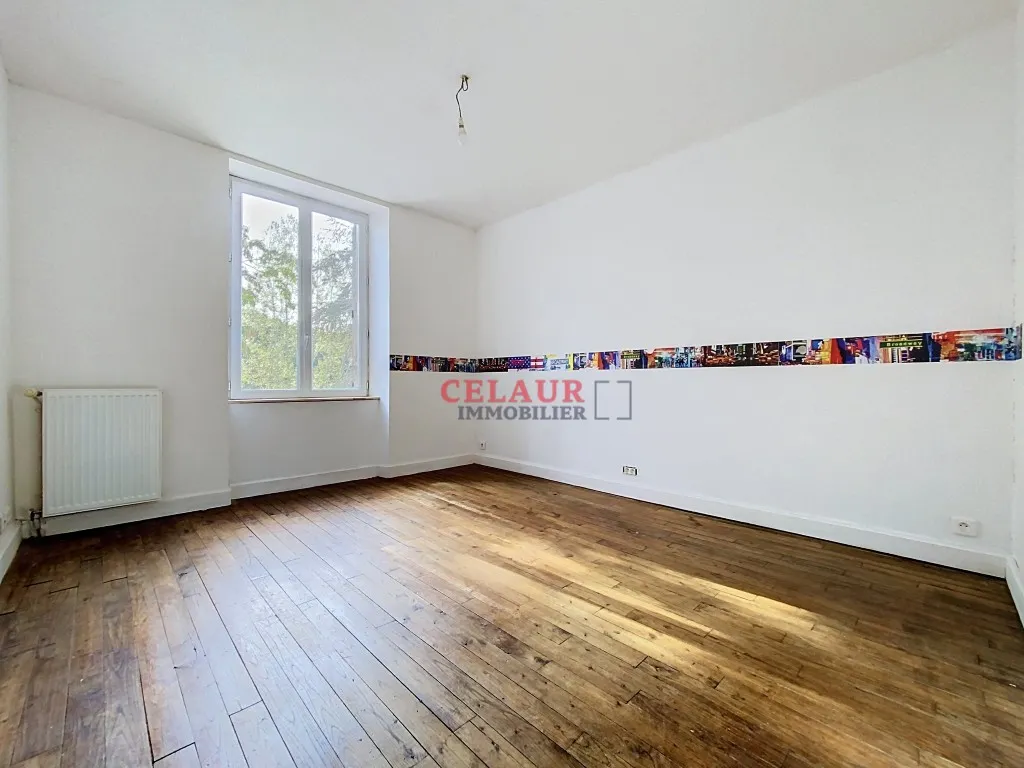 CHARMANTE MAISON AVEC JARDIN